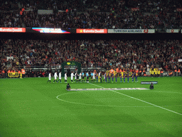 Players shaking hands at the start of the football match FC Barcelona - Sevilla FC in the Camp Nou stadium