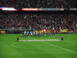 Players shaking hands at the start of the football match FC Barcelona - Sevilla FC in the Camp Nou stadium