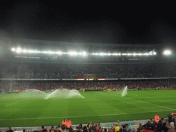 Field being sprayed during halftime at the football match FC Barcelona - Sevilla FC in the Camp Nou stadium