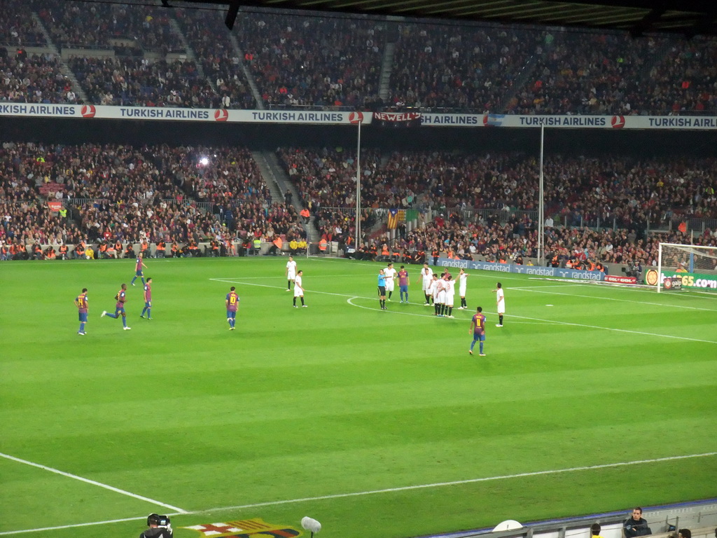 Lionel Messi taking a free kick at the football match FC Barcelona - Sevilla FC in the Camp Nou stadium