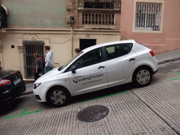 Car parked on a slope at the Baixada de la Glòria street