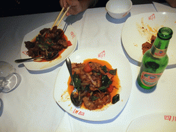 Dinner and Tsingtao beer at the `L`Olla de Sichuan` restaurant at the Carrer d`Aragó street