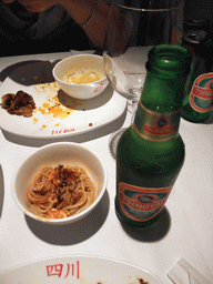 Dinner and Tsingtao beer at the `L`Olla de Sichuan` restaurant at the Carrer d`Aragó street