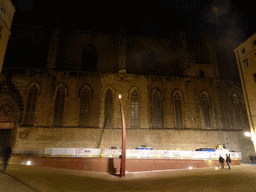 The Fossar de les Moreres monument and the east side of the Basilica de Santa Maria del Mar churc at the Plaça del Fossar de les Moreres square, by night
