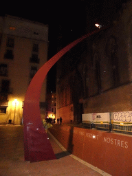 The Fossar de les Moreres monument and the east side of the Basilica de Santa Maria del Mar churc at the Plaça del Fossar de les Moreres square, by night