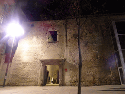 West side of the Centre Cívic Convent de Sant Agustí building, viewed from the Plaça de l`Acadèmia square, by night