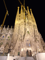 Northeast side of the Sagrada Família church with the Nativity Facade, under construction, viewed from the Carrer de la Marine street, by night