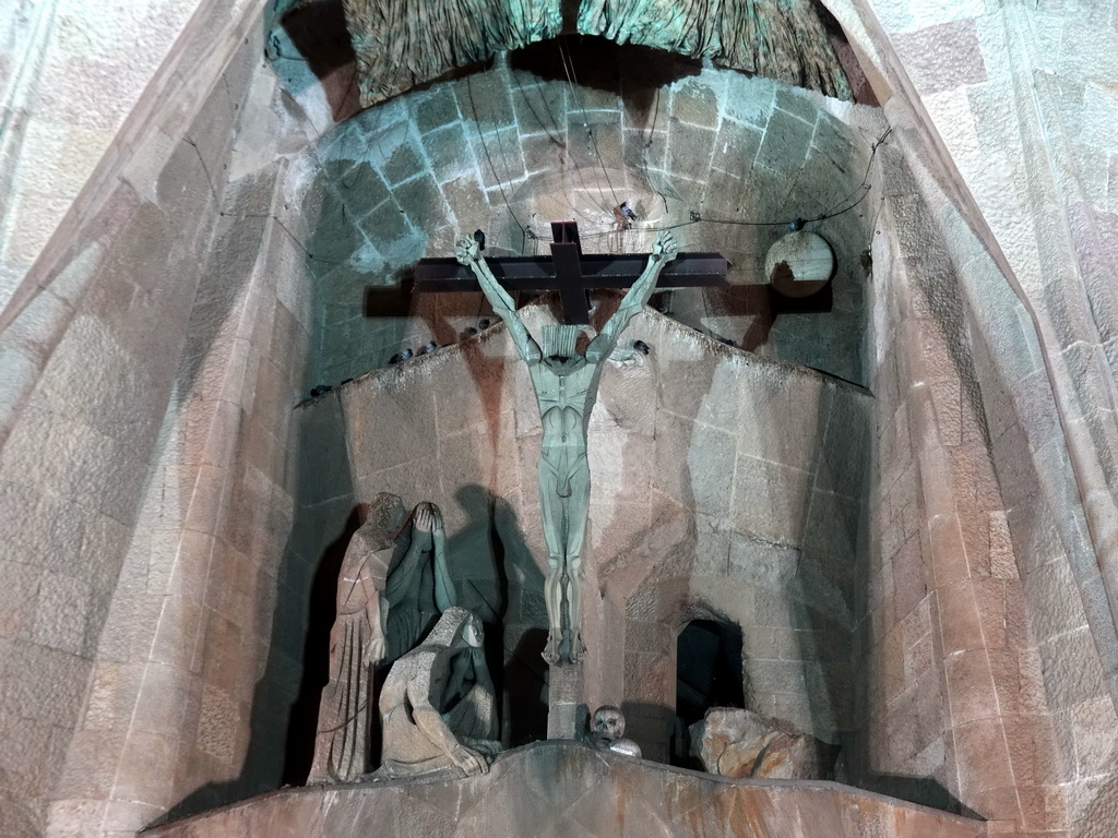 Statues at the Portico of the Passion Facade at the southwest side of the Sagrada Família church, viewed from the Plaça de la Sagrada Família square, by night