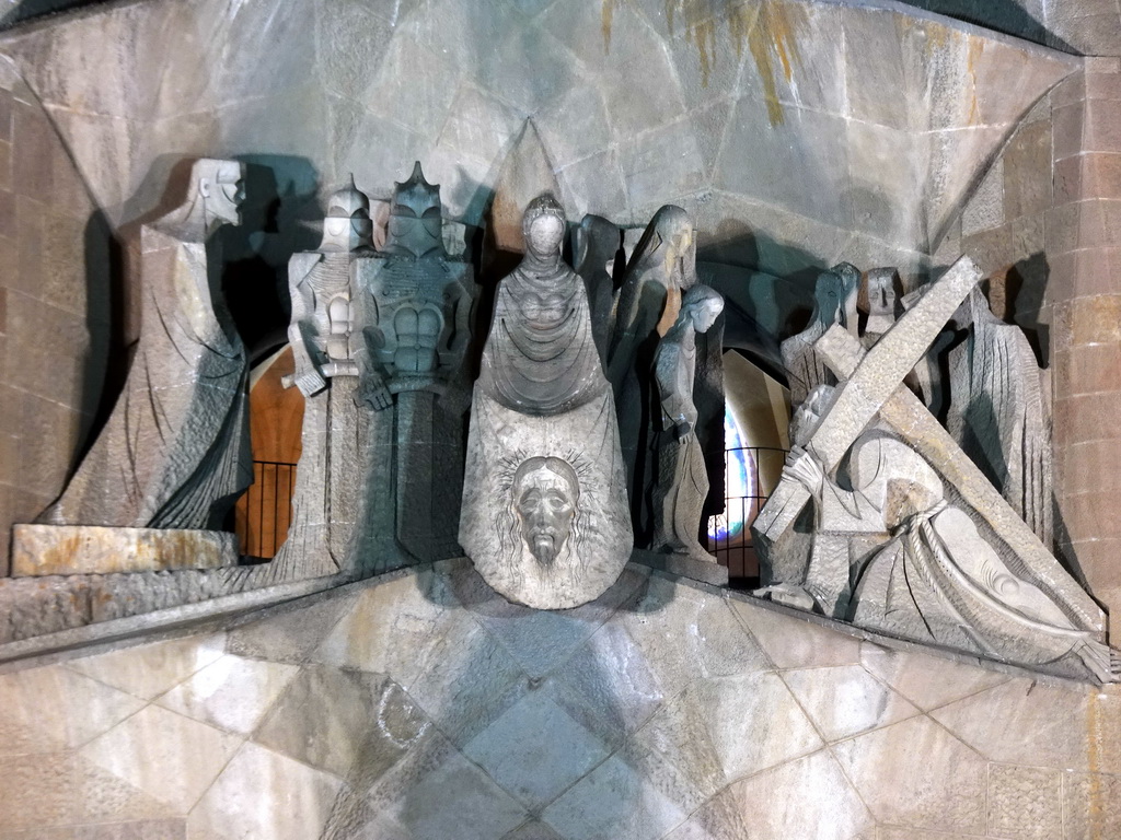 Statues at the Portico of the Passion Facade at the southwest side of the Sagrada Família church, viewed from the Plaça de la Sagrada Família square, by night