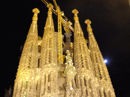 Northeast side of the Sagrada Família church, under construction, viewed from the Carrer de la Marina street, by night