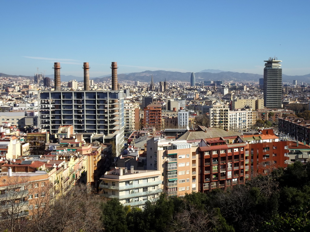 The city center with the Sagrada Família church, under construction, the Barcelona Cathedral, the Torre Glòries tower and the Edificio Colón tower, viewed from the Plaça de Carlos Ibáñez square at the northeast side of the Montjuïc hill