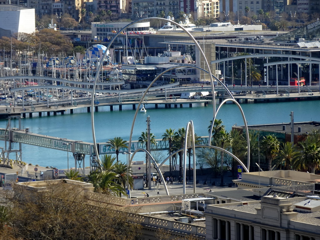 The sculpture `Onades` by Andreu Alfaro at the Plaça del Carbó square, viewed from the Plaça de l`Armada park at the northeast side of the Montjuïc hill