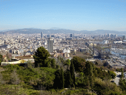 The city center with the Barcelona Cathedral, the Torre Glòries tower, the Edificio Colón tower and the Columbus Monument, viewed from the Mirador de l`Alcalde viewpoint at the east side of the Montjuïc hill