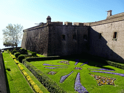 Flower bed and walls at the left side of the front gate of the Montjuïc Castle at the southeast side of the Montjuïc hill
