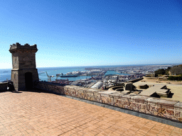 The Terrace and the southwest tower of the Montjuïc Castle at the southeast side of the Montjuïc hill, with a view on the Port de Barcelona harbour