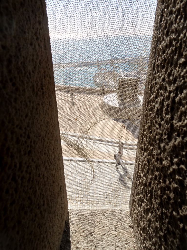 Cannon at the Sea Rampart of the Montjuïc Castle at the southeast side of the Montjuïc hill, viewed from the southeast tower