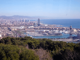 The Montjuïc Slide park at the east side of the Montjuïc hill, the city center and the Port Vell harbour, viewed from the Montjuïc Cable Car