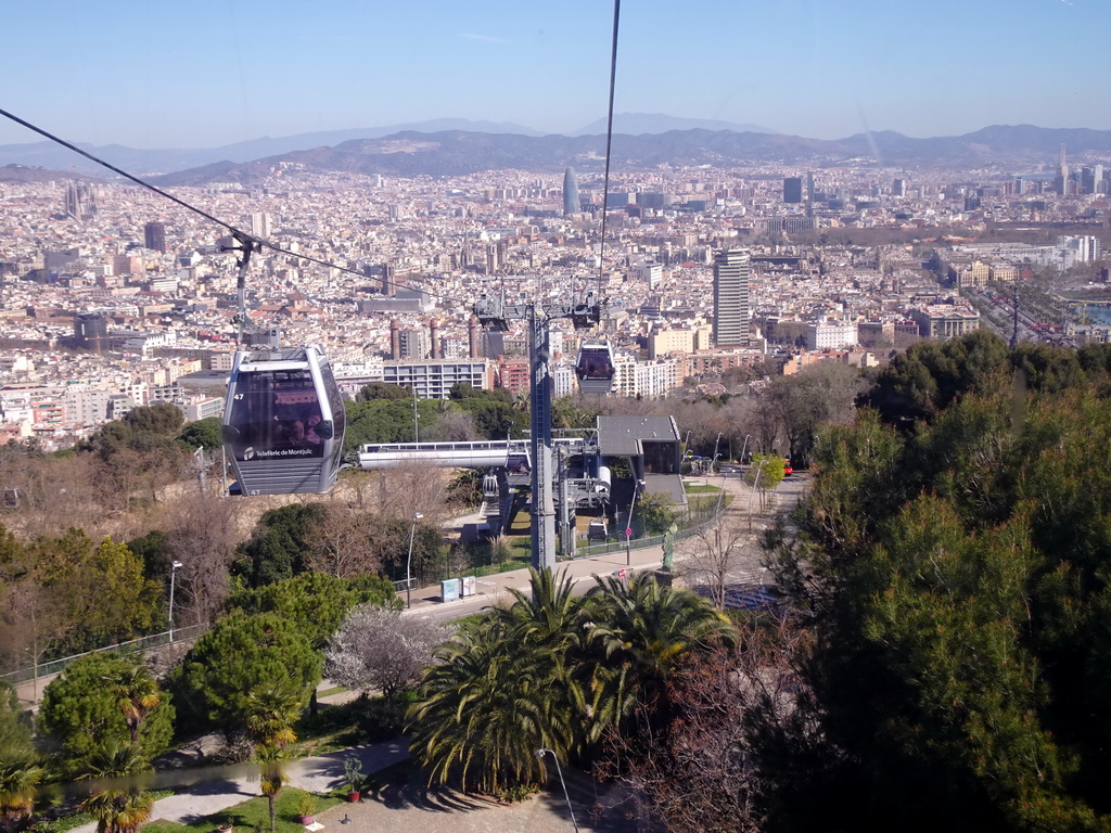 The Montjuïc Slide park at the east side of the Montjuïc hill and the city center with the Sagrada Família church and the Torre Glòries tower, viewed from the Montjuïc Cable Car