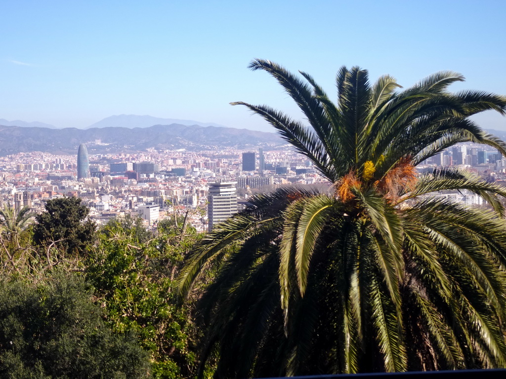 The Jardins de Joan Brossa gardens at the northeast side of the Montjuïc hill and the city center with the Torre Glòries tower, viewed from the Montjuïc Cable Car