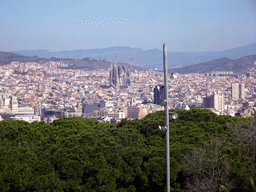 The Jardins de Joan Brossa gardens at the northeast side of the Montjuïc hill and the city center with the Sagrada Família church, viewed from the Montjuïc Cable Car