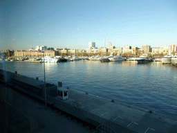 The Port Vell harbour and the front of the History Museum of Catalonia, viewed from the Explora! Children`s area at the Aquarium Barcelona