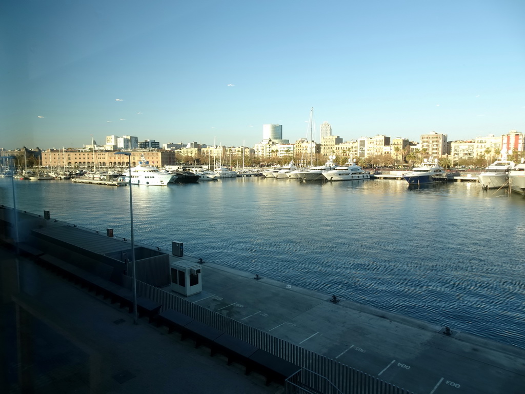 The Port Vell harbour and the front of the History Museum of Catalonia, viewed from the Explora! Children`s area at the Aquarium Barcelona