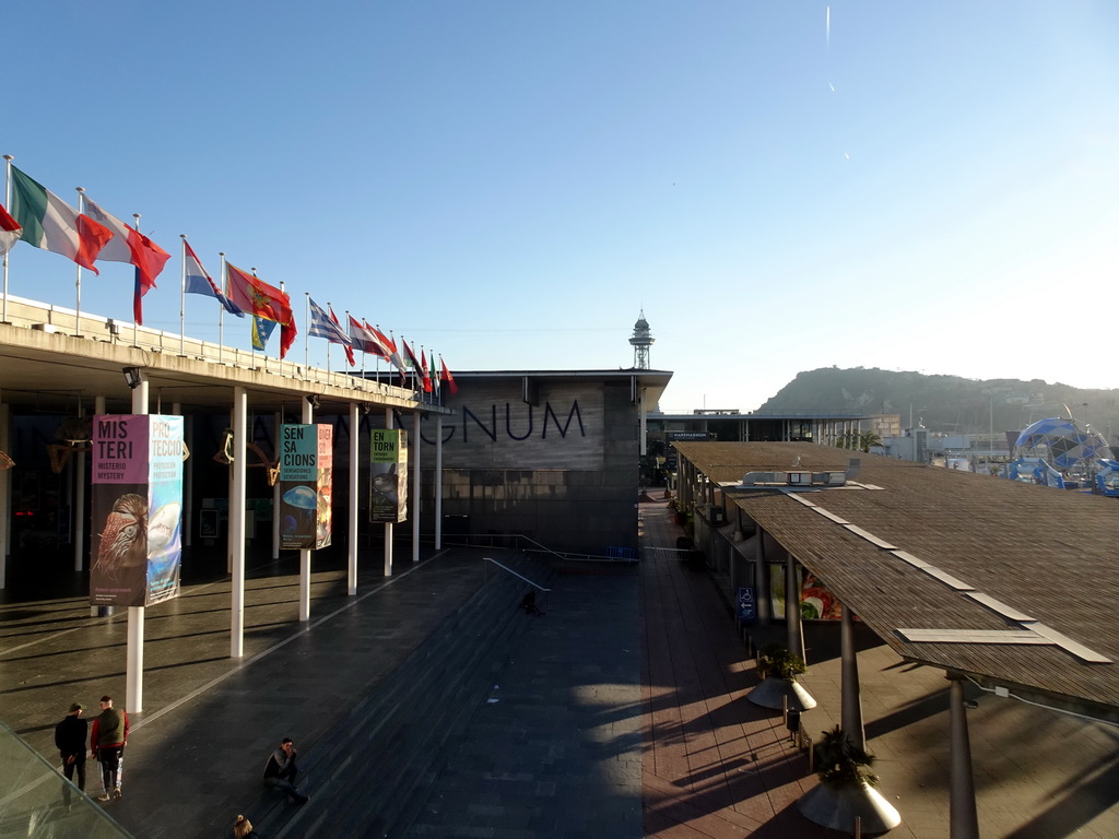 Front of the Aquarium Barcelona at the Passeig d`Ítaca street and the Montjuïc hill, viewed from the roof terrace