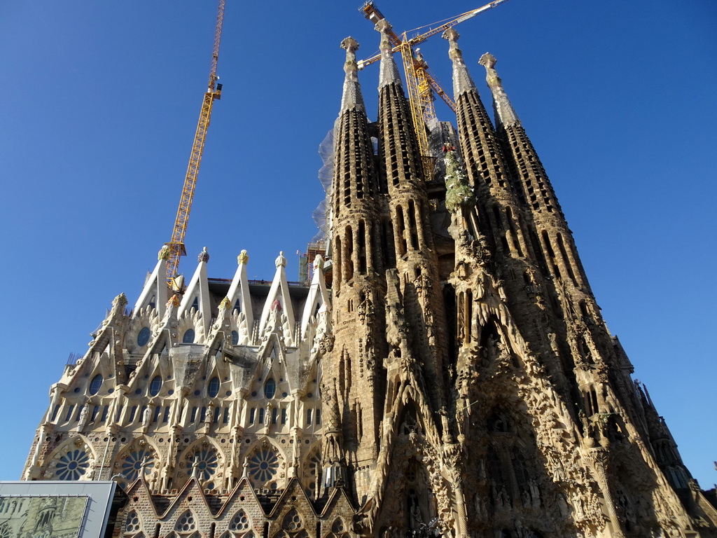 Northeast side of the Sagrada Família church with the Nativity Facade, under construction, viewed from the Carrer de la Marine street