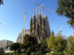 Northeast side of the Sagrada Família church with the Nativity Facade, under construction, viewed from the Plaça de Gaudí park