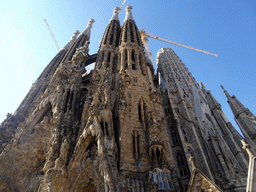 Northeast side of the Sagrada Família church with the Nativity Facade, under construction, viewed from the square right in front