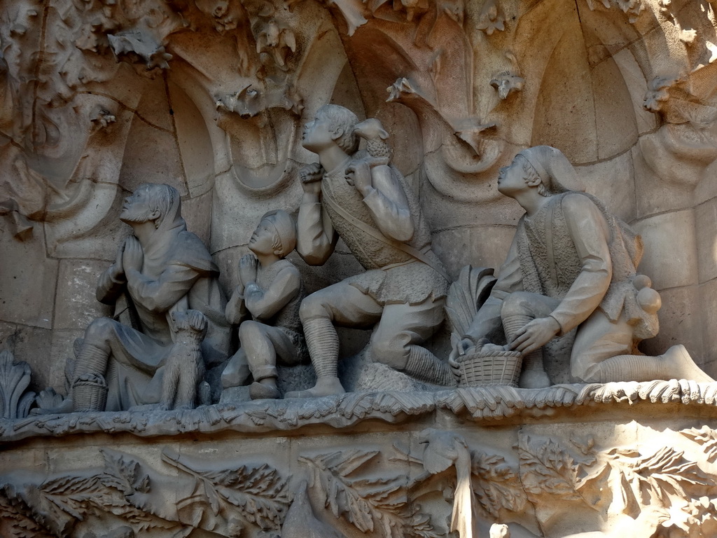 Statues at the Charity Hallway of the Nativity Facade at the northeast side of the Sagrada Família church