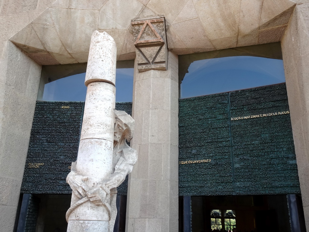 Statue in front of the door of the Passion Facade at the southwest side of the Sagrada Família church