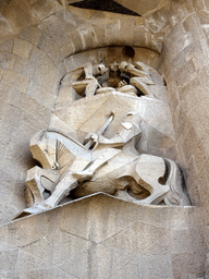 Statues at the left side of the Portico of the Passion Facade at the southwest side of the Sagrada Família church