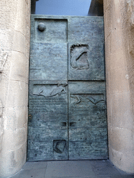 Door at the left side of the Passion Facade at the southwest side of the Sagrada Família church