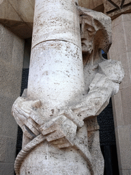 Statue in front of the door of the Passion Facade at the southwest side of the Sagrada Família church