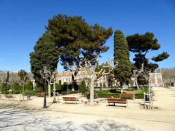 Trees at the Parc de la Ciutadella park and the front of the Palau del Parlament de Catalunya building