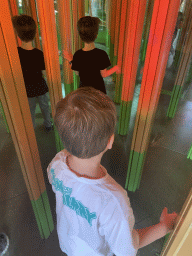 Max and his friend at the Rainforest Mirror Maze attraction at the funfair at the Brigidastraat street