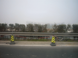 The Beijing National Stadium (`Bird`s Nest`), viewed from the car