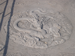 Snake relief on the pavement in front of the Palace of Heavenly Purity at the Forbidden City