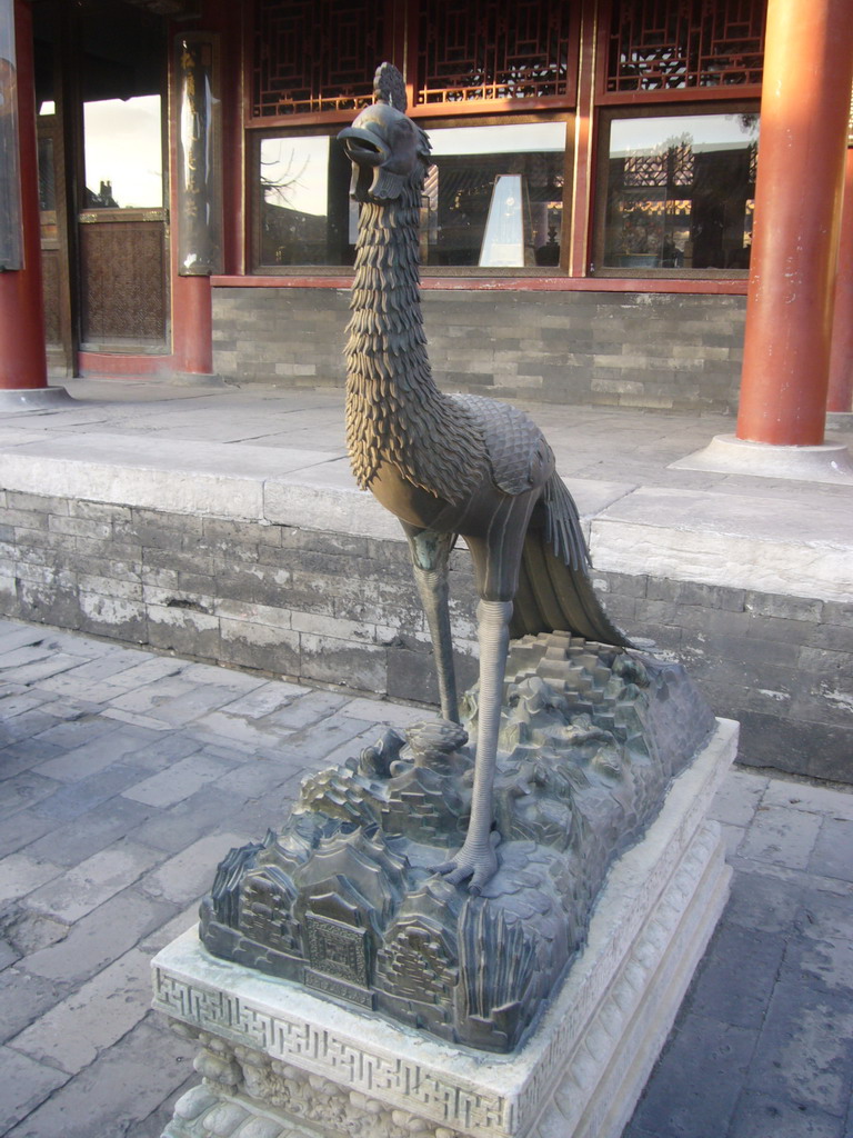 Bird statue in front of the Hall of Harmonious Conduct at the Forbidden City