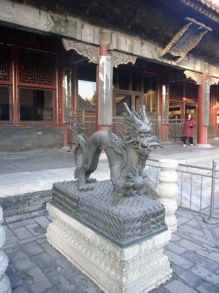 Dragon statue in front of the Hall of Harmonious Conduct at the Forbidden City