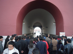 The Flag-Lowering Ceremony at Tiananmen Square, with the Monument to the People`s Heroes and the Mausoleum of Mao Zedong, viewed through the Gate of Heavenly Peace, at sunset