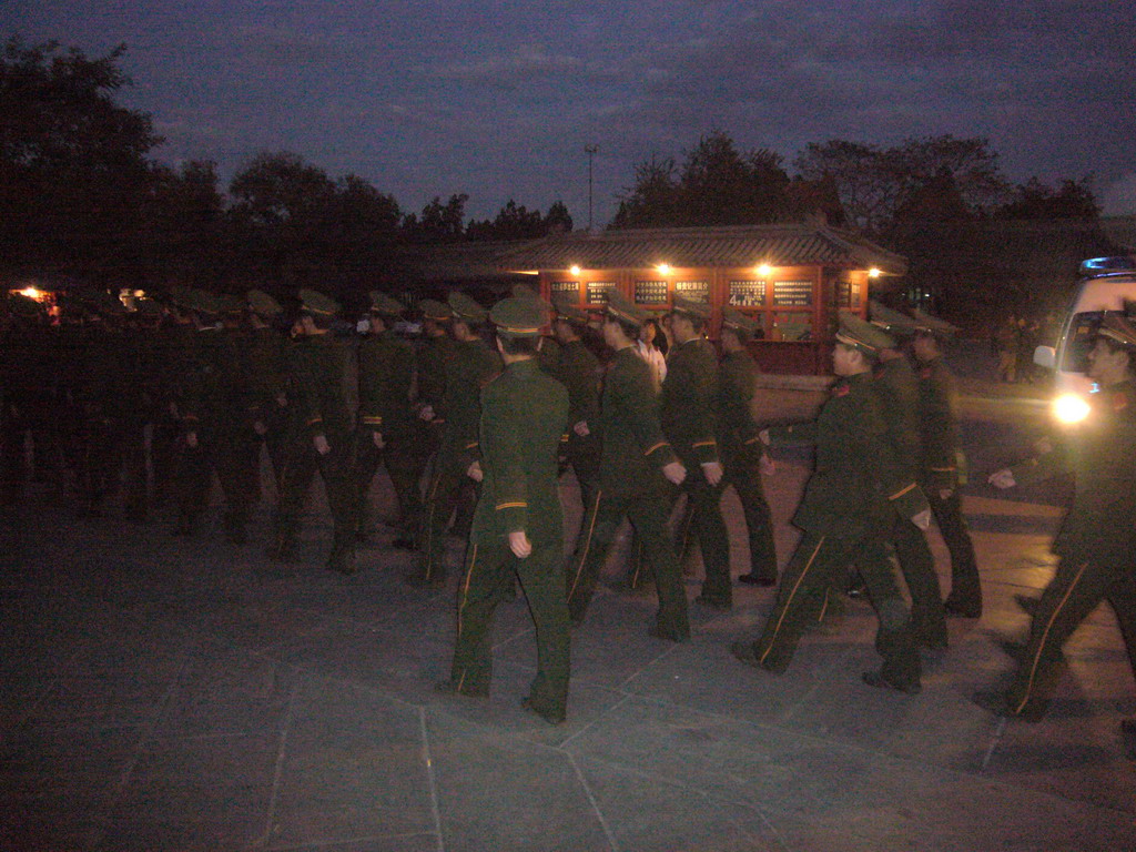 Guards marching from the Gate of Heavenly Peace to the Upright Gate, during the Flag-Lowering Ceremony, by night