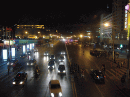 Xidan North Street, viewed from a walkway over the street, by night
