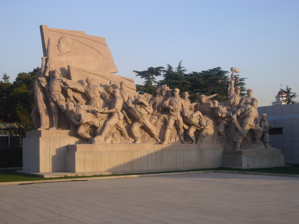Sculpture at the west side of the entrance to the Mausoleum of Mao Zedong at Tiananmen Square