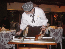 Cook preparing Peking Duck at the Quanjude Roast Duck Restaurant