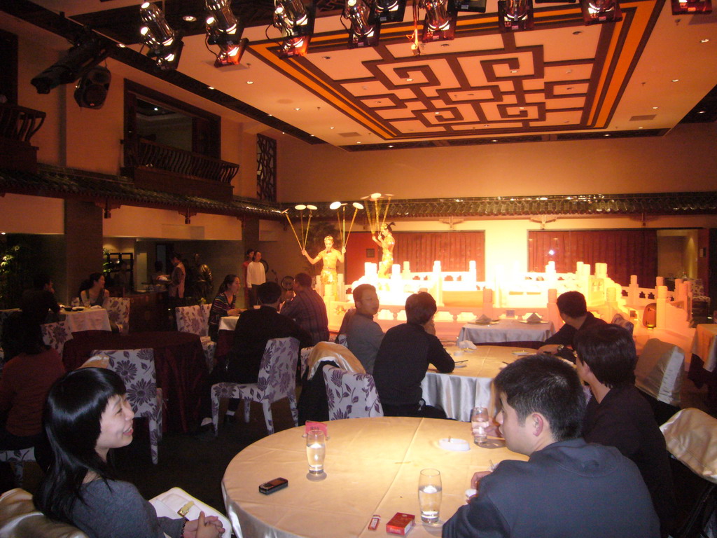 Acrobats with plates at the Quanjude Roast Duck Restaurant