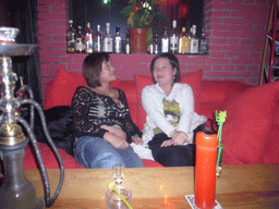 Miaomiao and her cousin in a pub at Beihai Lake