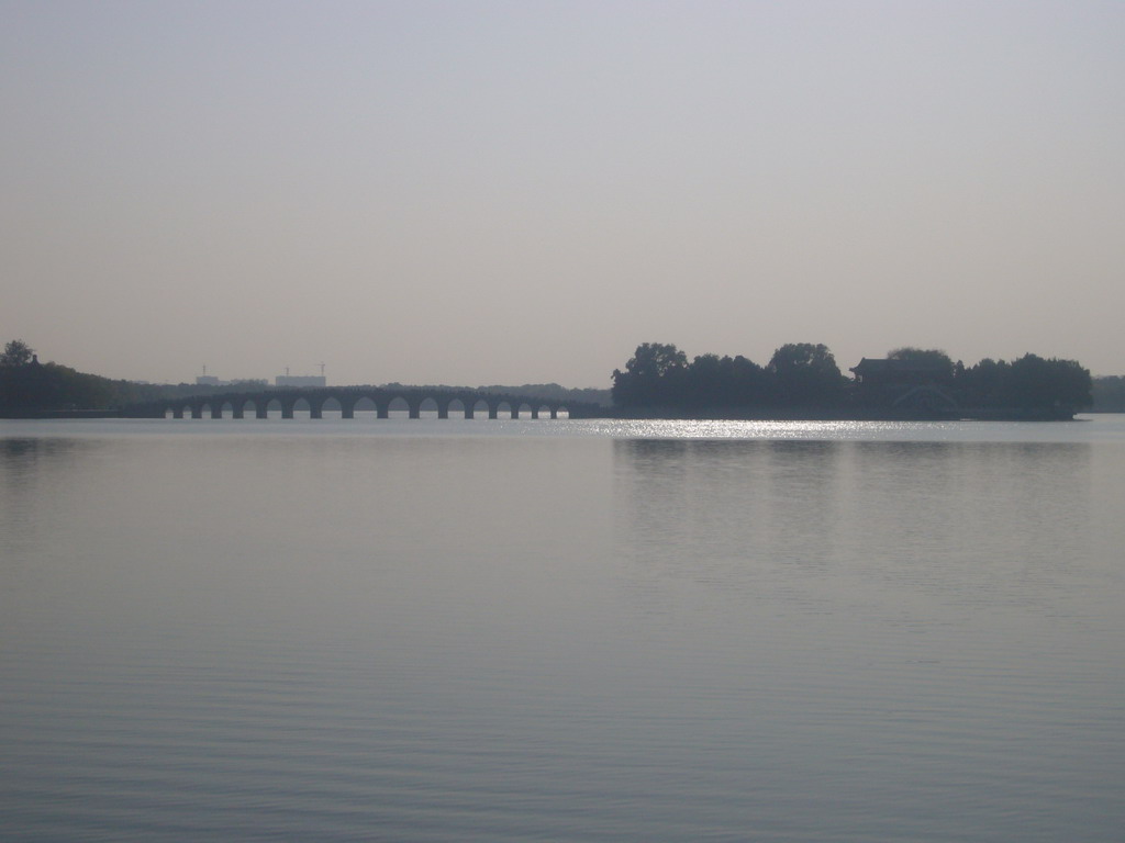 The Seventeen-Arch Bridge over Kunming Lake and the South Lake Island at the Summer Palace, viewed from near the Wenchang Tower