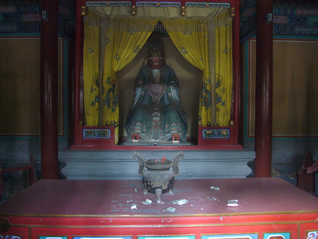 Altar and statue at the Dragon King`s Temple at the South Lake Island at the Summer Palace